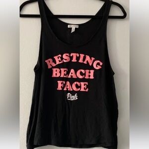 Resting beach face VS pink cropped flowy tank top